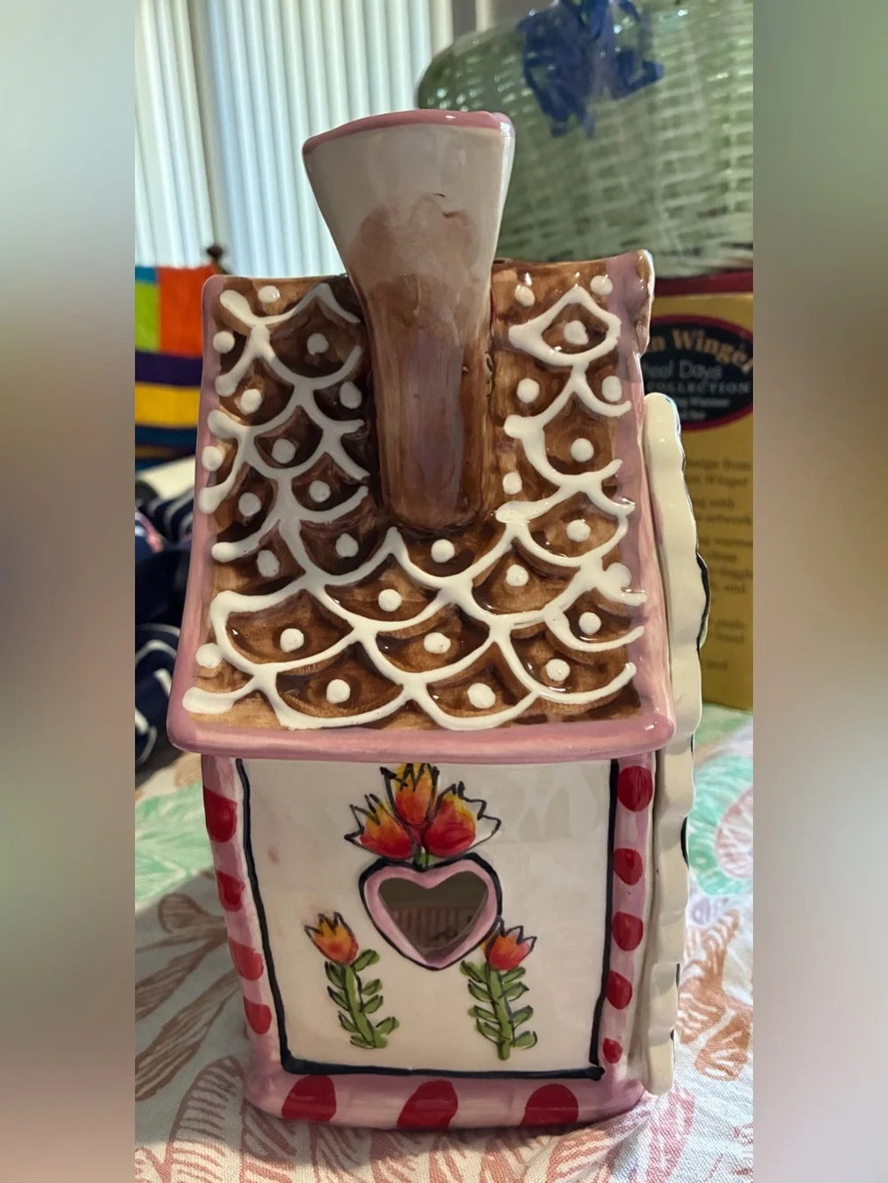 Blue Sky “The Gingerbread Cottage”. In new condition. Pink, brown, red & green.